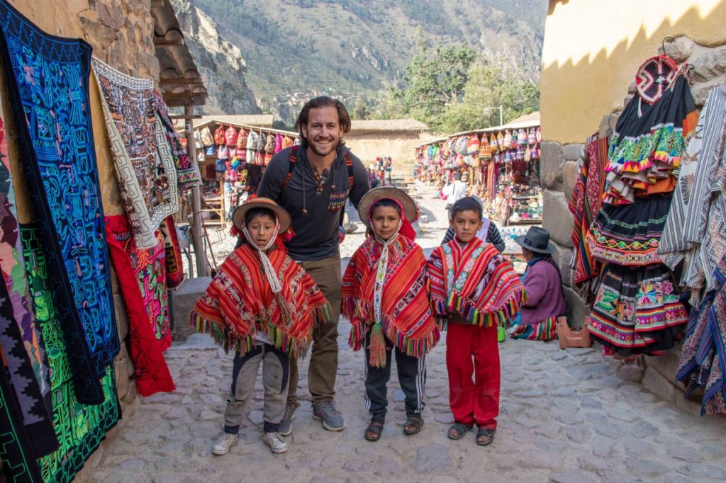 WanderWithUs-Peru-SacredValley-Ollantaytambo-NeilWithLocalBoys